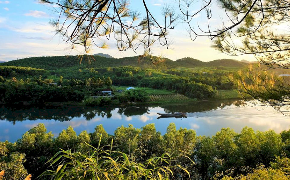 A breathtaking view from Vong Canh Hill, where the Perfume River winds through lush hills